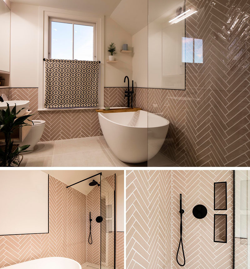 This updated bathroom by Woodrow Architects features tiles laid in a herringbone pattern that wrap around the walls, and a freestanding bathroom positioned next to a shower with black accents. #BathroomDesign Visit Woodrow Architect's website here > https://www.wdrw.co.uk