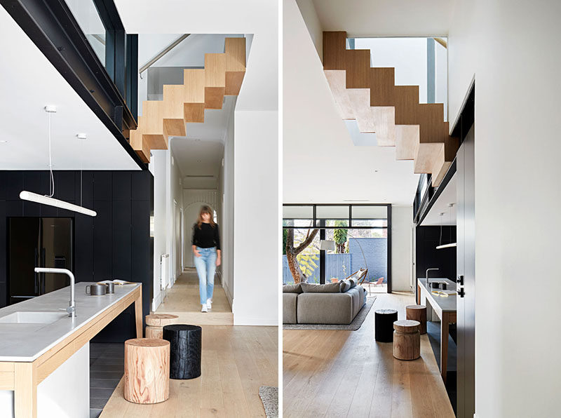 In this renovated house, a simple hallway leads to the open plan kitchen, dining room, and living room. #InteriorDesign