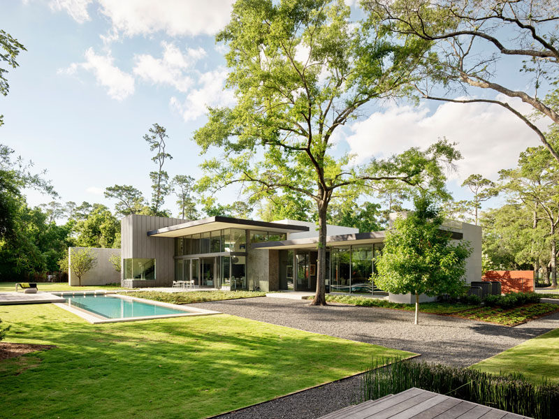Ehrlich Yanai Rhee Chaney Architects has designed a modern house on a two-acre wooded site in an upscale neighborhood in Houston, Texas. #ModernHouse #ModernArchitecture