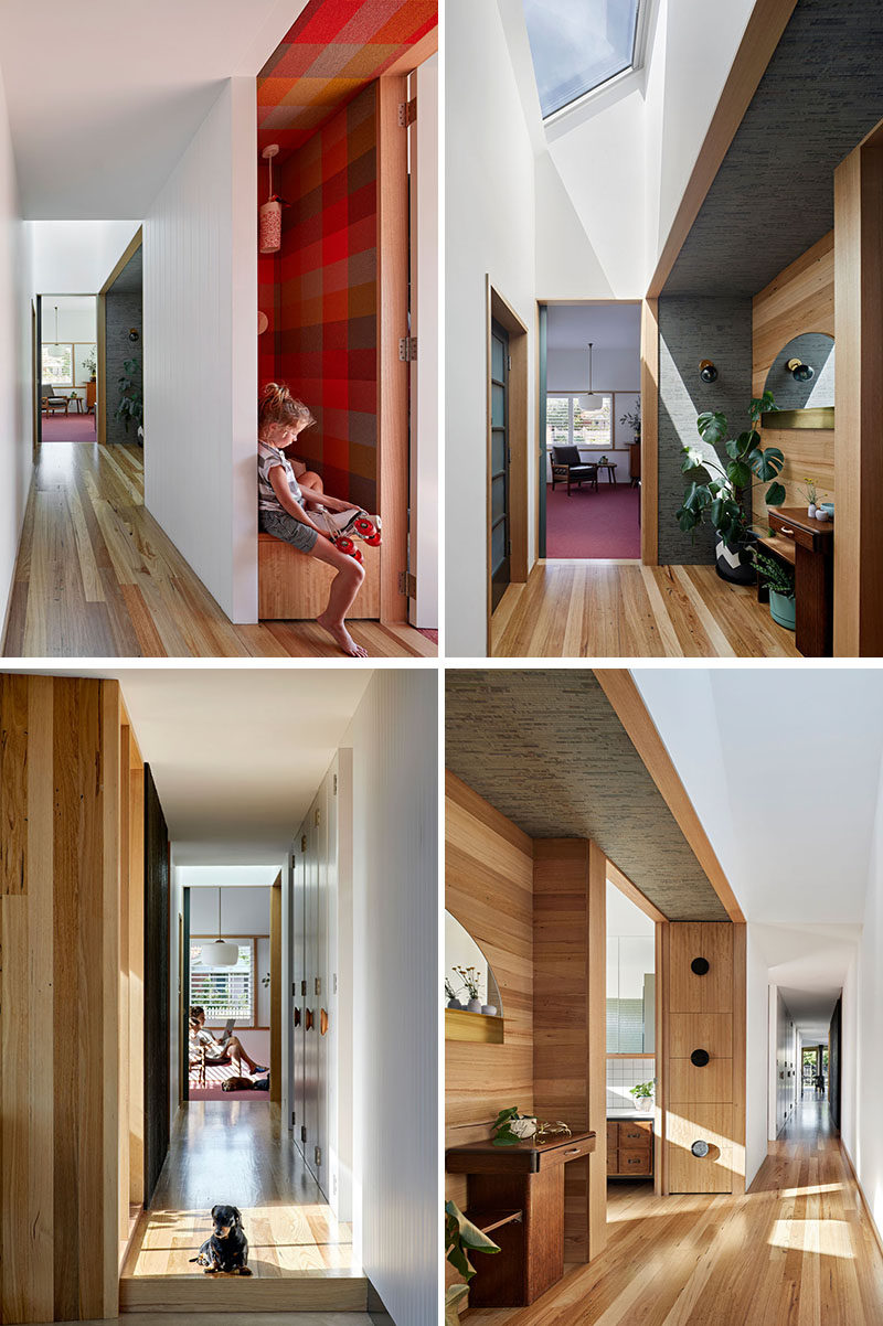 This hallway that connects the new additional to the original rooms of the house, has a skylight to keep it bright, while wood flooring adds warmth. #Hallway #InteriorDeisgn