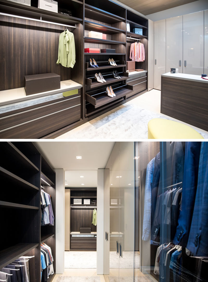 The master suite in this modern house has a large walk-in closet with plenty of room for hanging clothes, displaying shoes, and storing folded garments. #WalkInCloset #Closet