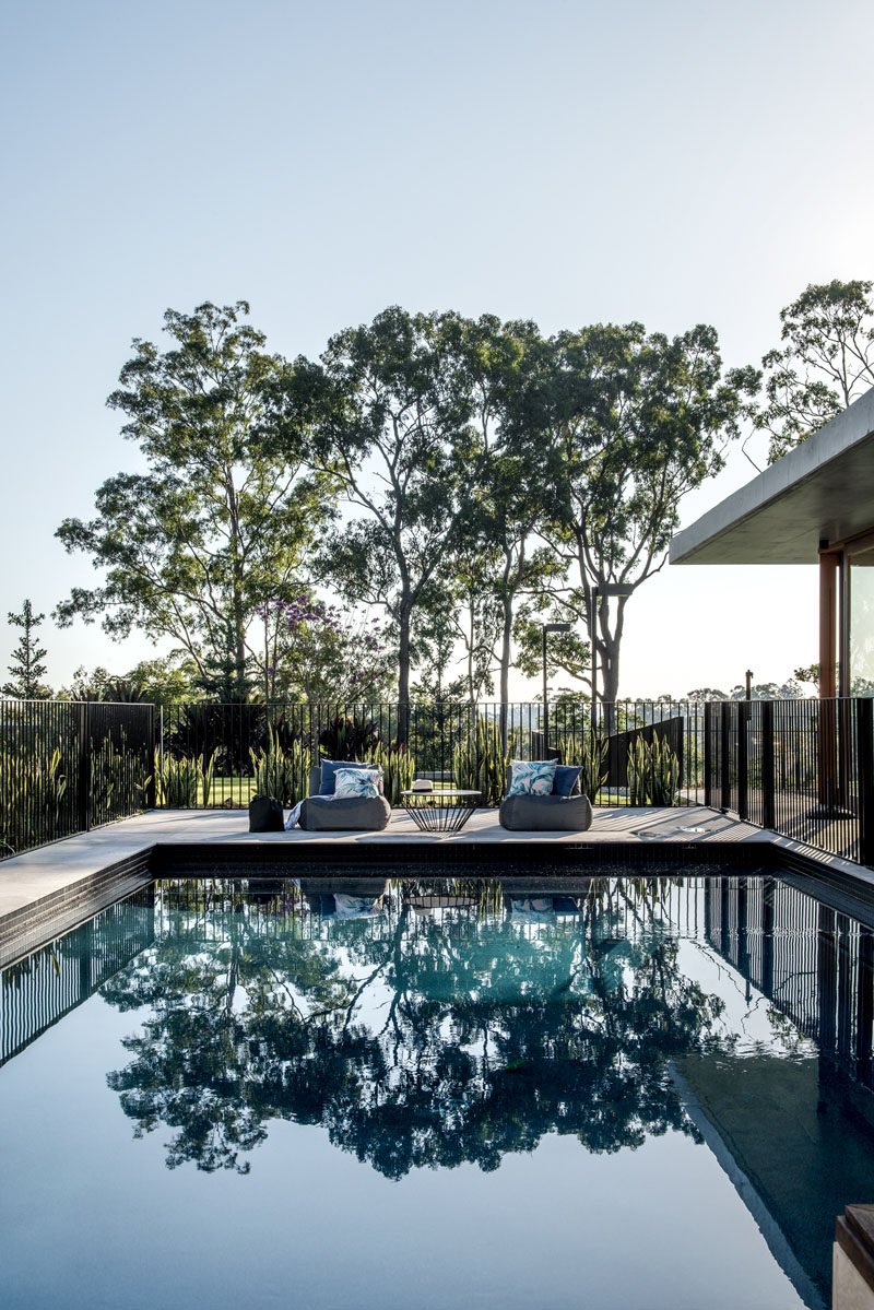 A swimming pool with views of the surrounding bush is ideal for cooling off on a hot summer day. #SwimmingPool