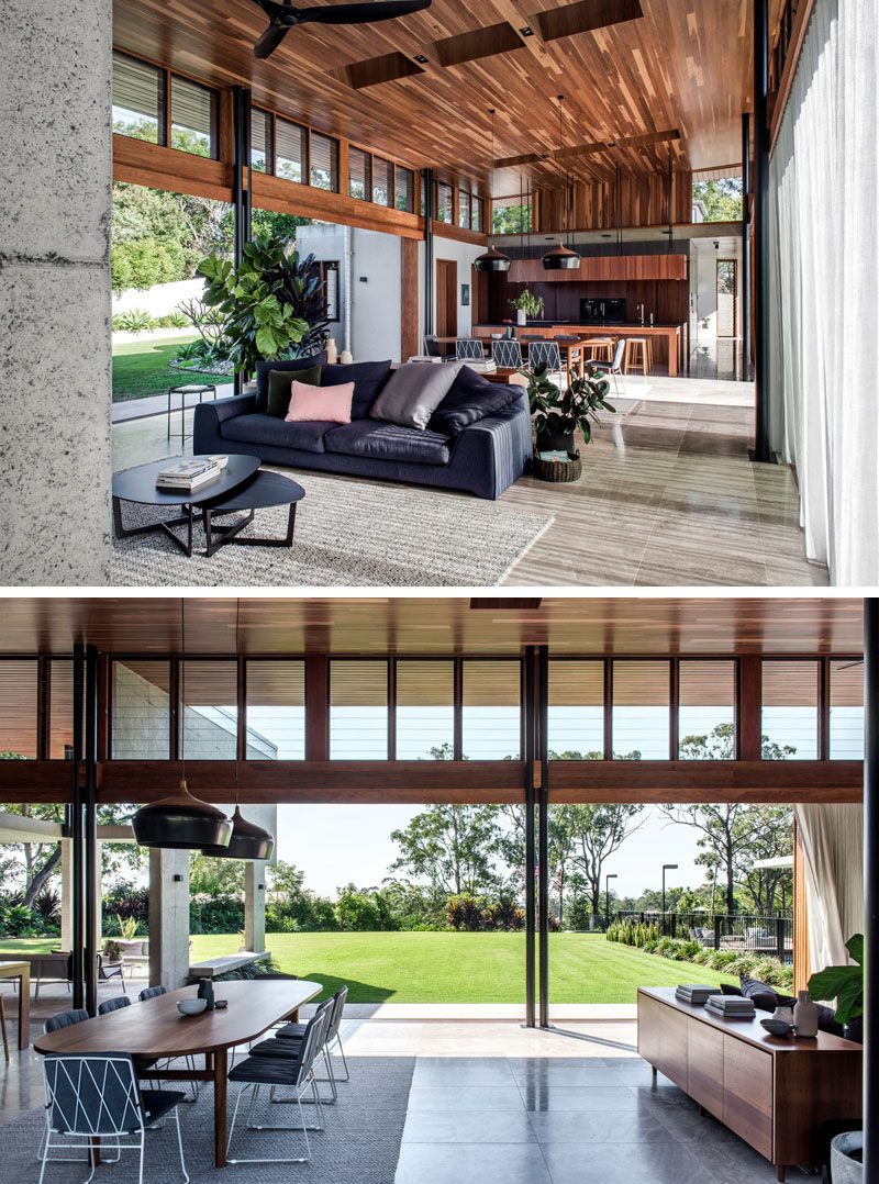 The interior of this modern house has a palette of sandblasted concrete, Spotted Gum timber and natural stone, to create a robust, warm and timeless aesthetic. #ModernHouse #InteriorDesign #WoodCeiling