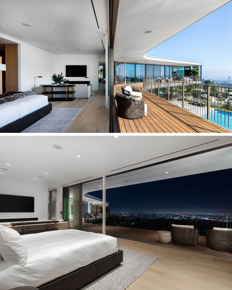 This master suite, with a private lounge area, has sliding doors that open up to the wrap-around balcony that provides 270-degree views of the city and ocean, and the outdoor spaces below. #MasterSuite #Balcony