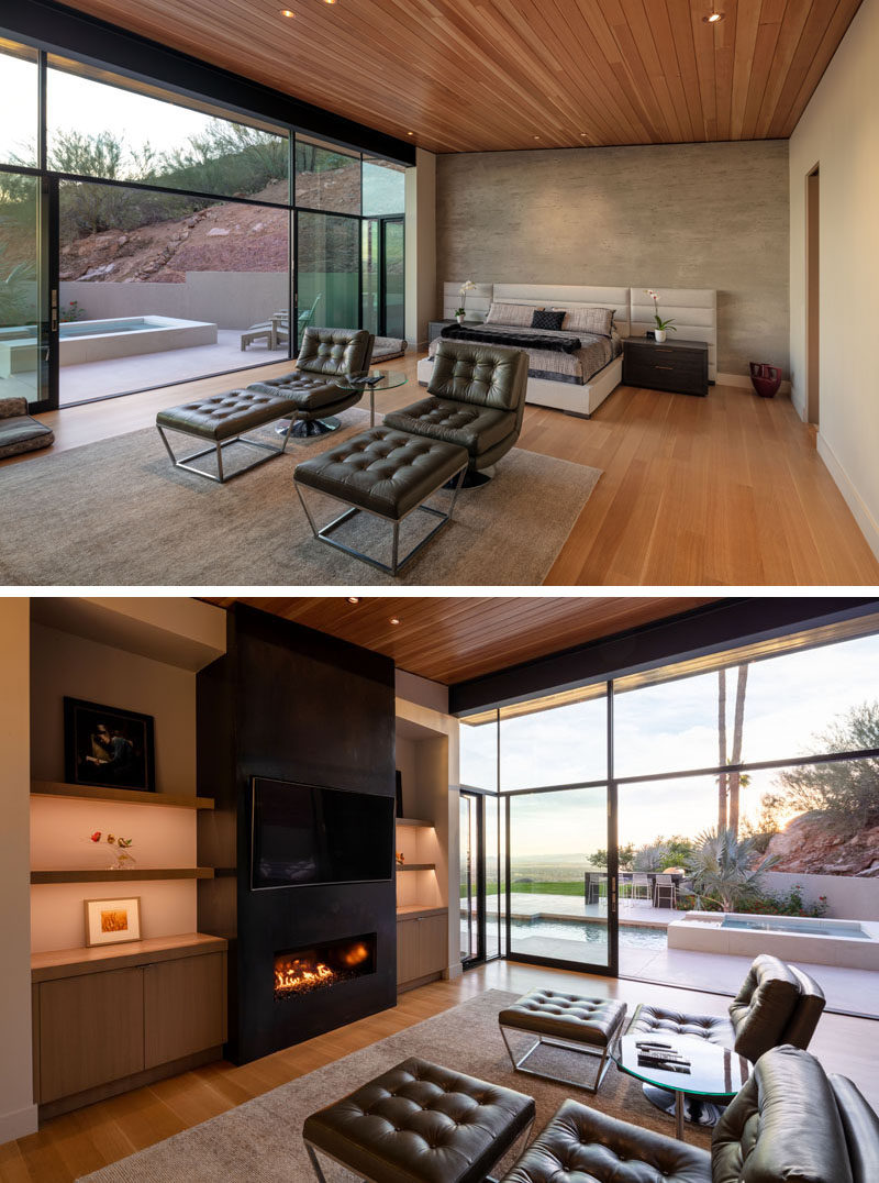 This modern master bedroom has both wood flooring and a wood ceiling, as well as a lounge area with a fireplace, and direct access to the pool and patio outside. #MasterBedroom #BedroomDesign #Fireplace
