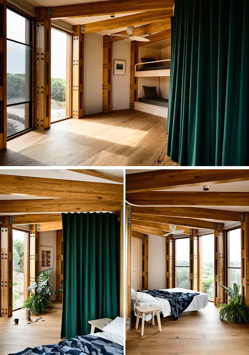 Unlike a traditional bedroom layout, the upstairs sleeping area of this modern circular house, is essentially one bunk room, separated by curtains, allowing the space to be used as a second living or games room. #Bedrooms #CircularHouse