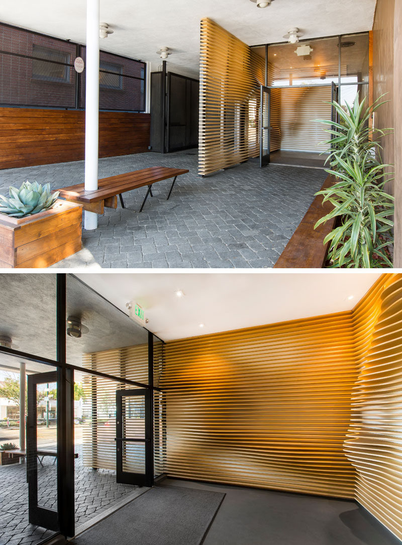 Baran Studio have designed a sculptural accent wall, made from CNC cut plywood, for the lobby of a building in California. #WoodAccentWall #WoodWall #AccentWall #OfficeDesign