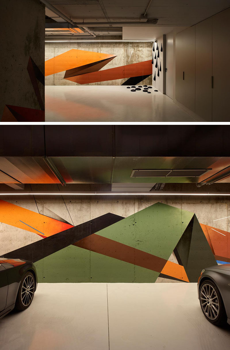 This garage features a mural by the artist Remi Rough, as well as a sculpture by Fred Wilson. #Mural #Art #Garage