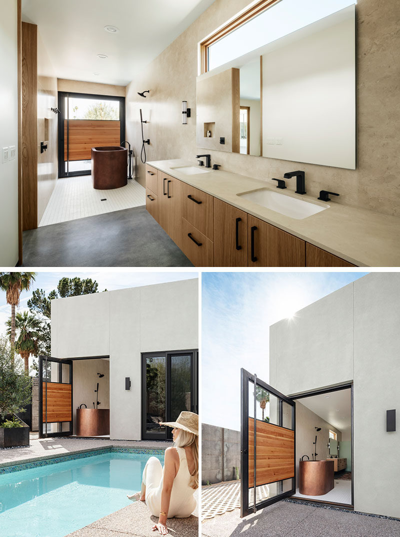 This modern master bathroom features honed marble , a walk-in shower area, a copper soaking tub, and a custom pivoting door that opens to a courtyard. #MasterBathroom #BathroomDesign #PivotingDoor