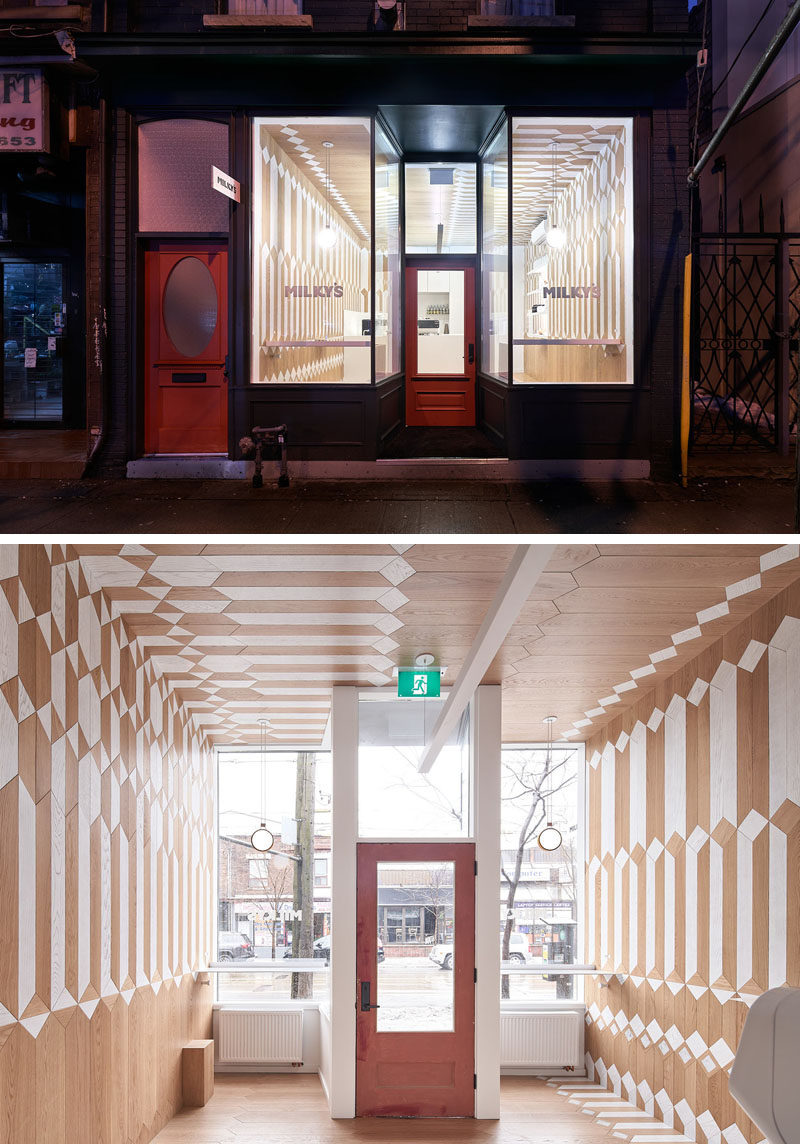 This modern coffee shop has a fun and bright geometric pattern on the walls, floor, and ceiling, made from white-washed wood and natural wood. #CoffeeShop #Cafe #InteriorDesign #RetailDesign