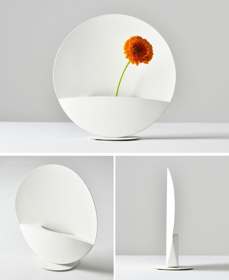 Shinya Oguchi has designed 'Picture', a minimalist white flower vase that has a strong magnet allowing the user to change the angle of the vase. #Vase #HomeDecor #Design