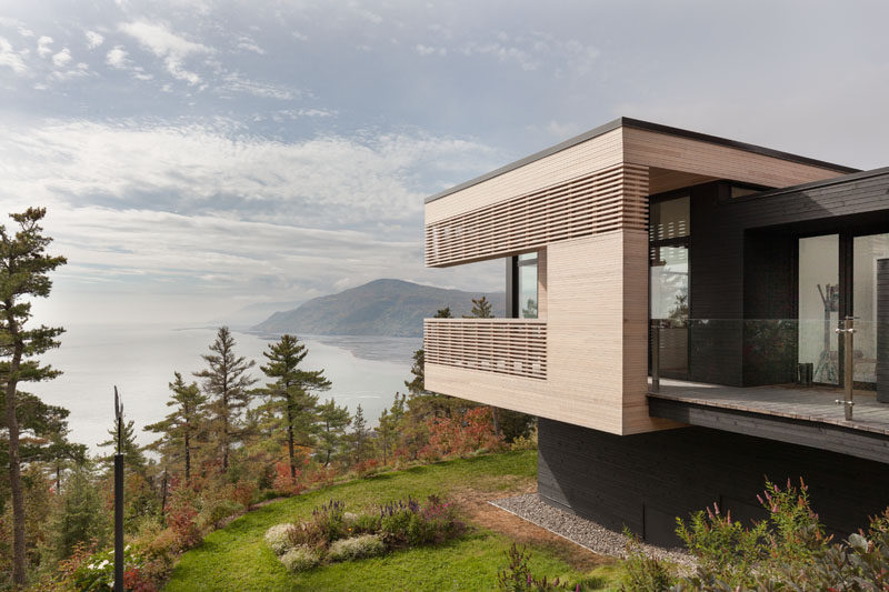 Anne Carrier architecture (AC/ a) has designed a new modern house in Cap-aux-Corbeaux, Quebec, that overlooks the St. Lawrence River. #ModernHouse #HouseDesign #ModernArchitecture