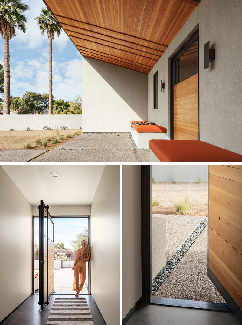 At the front of this modern house is a semi-private courtyard with woven wood ceiling and bench seating on either side of a pivoting front door. #FrontDoor #Landscaping