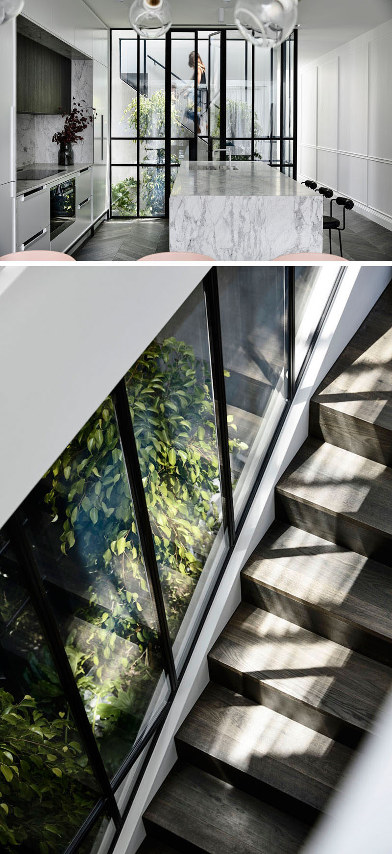 A plant-filled, glass-enclosed atrium opens up the center of this modern house and allows for views between the kitchen and staircase to the children’s bedrooms upstairs. #Atrium #InteriorDesign #Stairs #Windows #Architecture