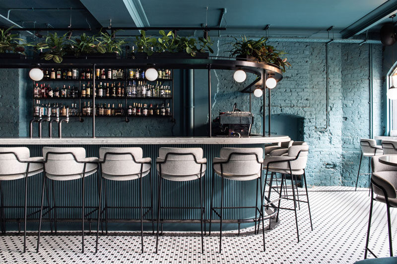 Australian based design studio Biasol has recently completed Greenwich Grind, a coffee-and-cocktail restaurant that's located opposite the famous Greenwich Market in London, England. #BarDesign #Restaurant #ModernBar