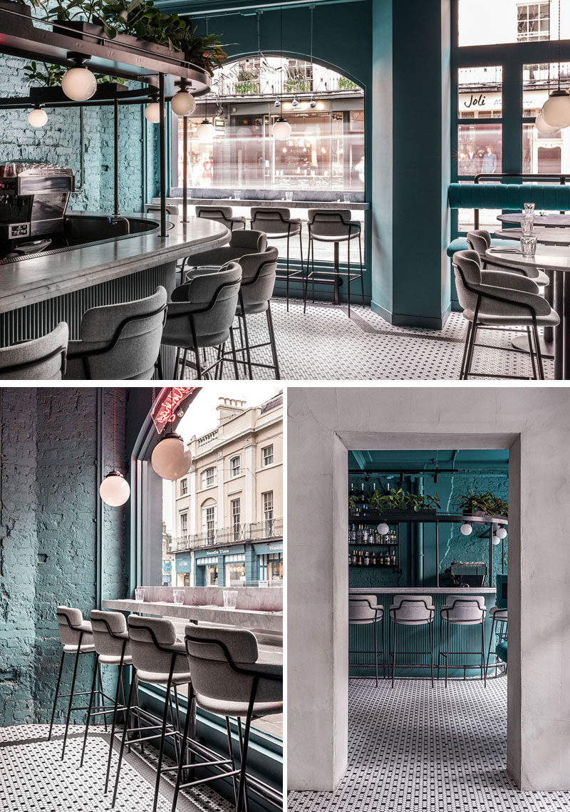 The Green Room is an intimate cocktail bar with a deep-turquoise-blue backdrop and elegant stools around the bar and window. #ModernBar #BarDesign #Stools