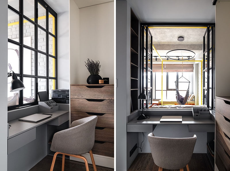 Black-framed windows have been installed in this small and modern apartment to allow the natural light from the main windows to reach through to the home office. #HomeOffice #InteriorWindow