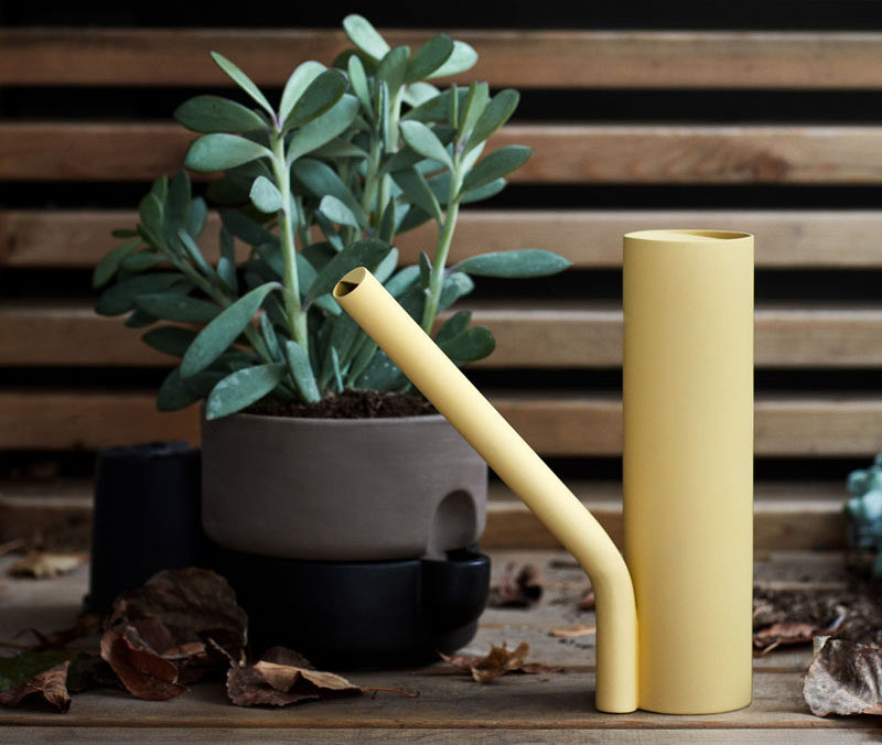 Norwegian designer Stine Aas has created Grab, a new minimalist watering can that's formed by two interconnected cylinders. #WateringCan #Design #Plants