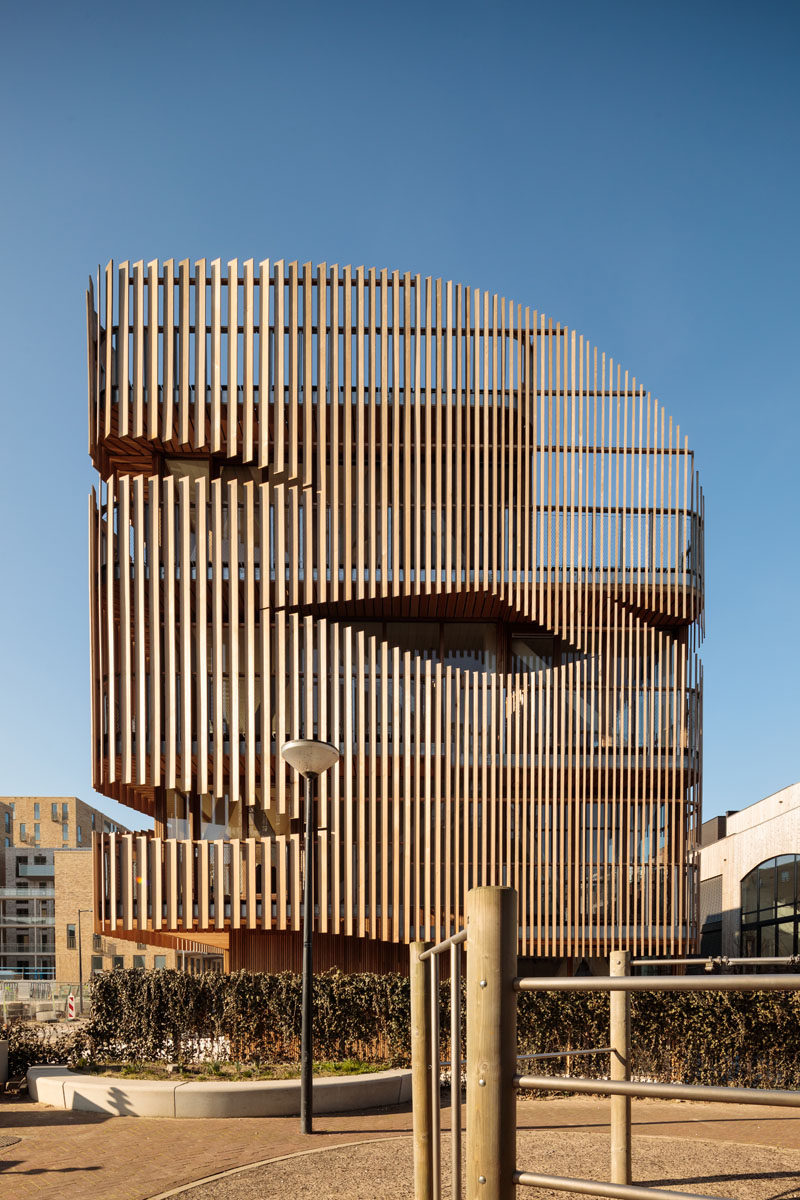 Amsterdam-based studio GG-loop has recently completed 'Freebooter', a new pre-fabricated building that houses two separate residences, and features a parametric louvered facade. #ModernArchitecture #Louvers #WoodSlatFacade #BuildingDesign