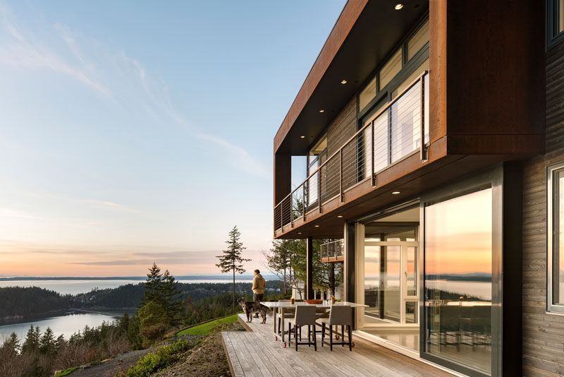 Natural steel (weathered over time) and black stained cedar were chosen to blend this house in with the landscape. #ModernHouse #WeatheredSteel #BlackStainedCedar