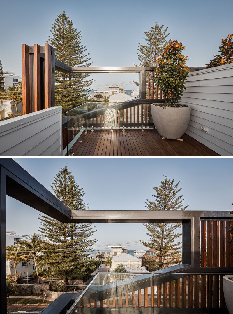 This modern house features a rooftop deck that provides water views over the top of other houses in the neighborhood. #RooftopDeck