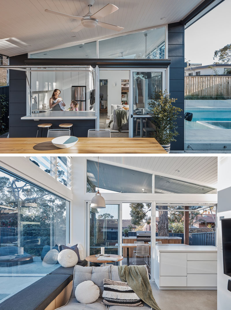 Angled windows that follow the roof-line and a glass sliding door allow as much natural light into this small house as possible. #SmallHouse #TinyHouse #GrannyFlat #Windows