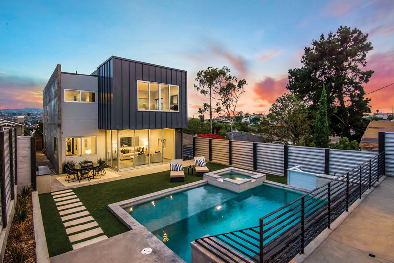 Located in Redondo Beach, California, the Avenue A Residence is focused on maximizing the views and natural lights, while the backyard is ideal for entertaining. #ModernHouse #ModernBackyard #ModernSwimmingPool #ModernLandscaping