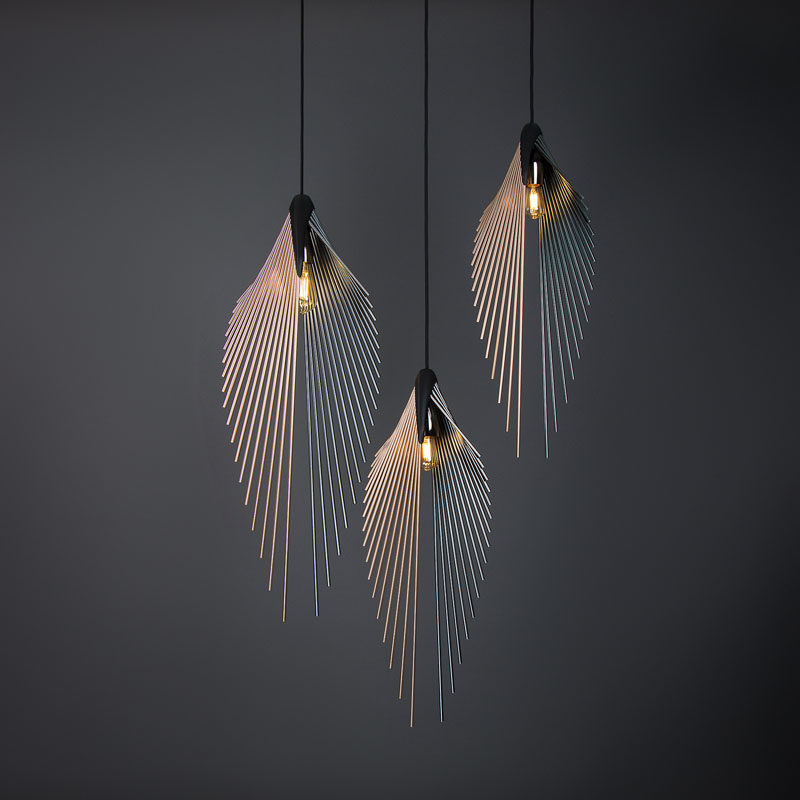 This modern pendant light's shape is defined by the anodized aluminium poles, fixed in a 3D printed holder, following a V-shaped geometry, while an Edison Vintage LED bulb completes the appearance. #ModernLighting #LightingDesign #PendantLighting