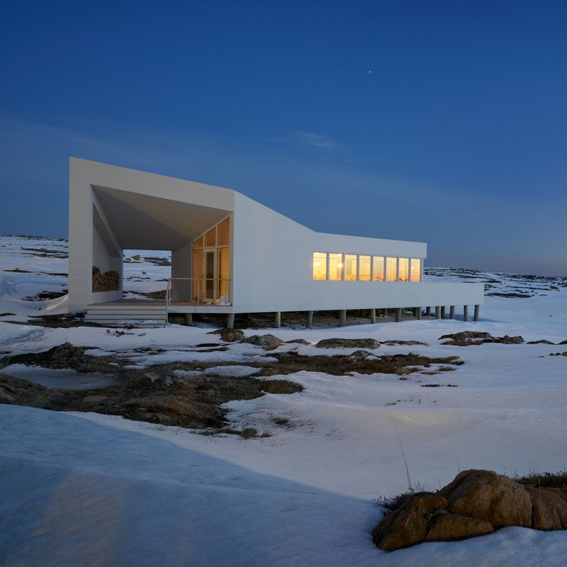 This design of this modern dining room for the Fogo Island Shed Hotel, was inspired by the vernacular forms of the region’s traditional fishermen’s huts and houses. #ModernArchitecture