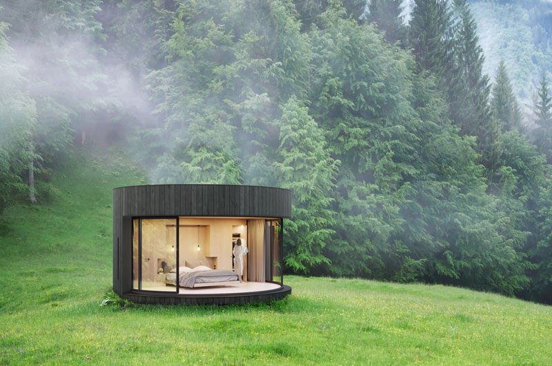 LUMICENE has recently launched LUMIPOD, a small and modern prefab cabin that's designed around their curved window, allowing the interior of the cabin to be opened to nature. #Cabin #PrefabCabin #Design