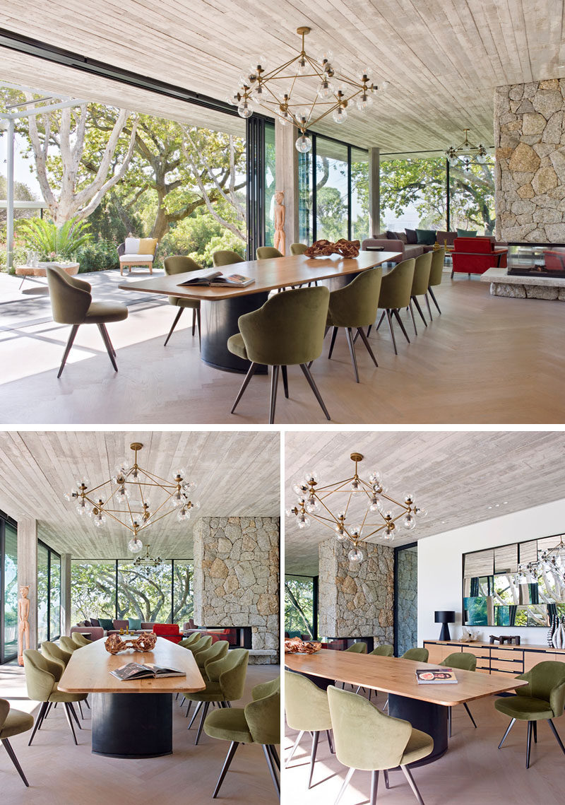 In this modern and open plan dining area, a custom OKHA dining table is surrounded by Minotti dining chairs and a sculptural pendant light. #ModernDiningRoom #OpenPlanDining