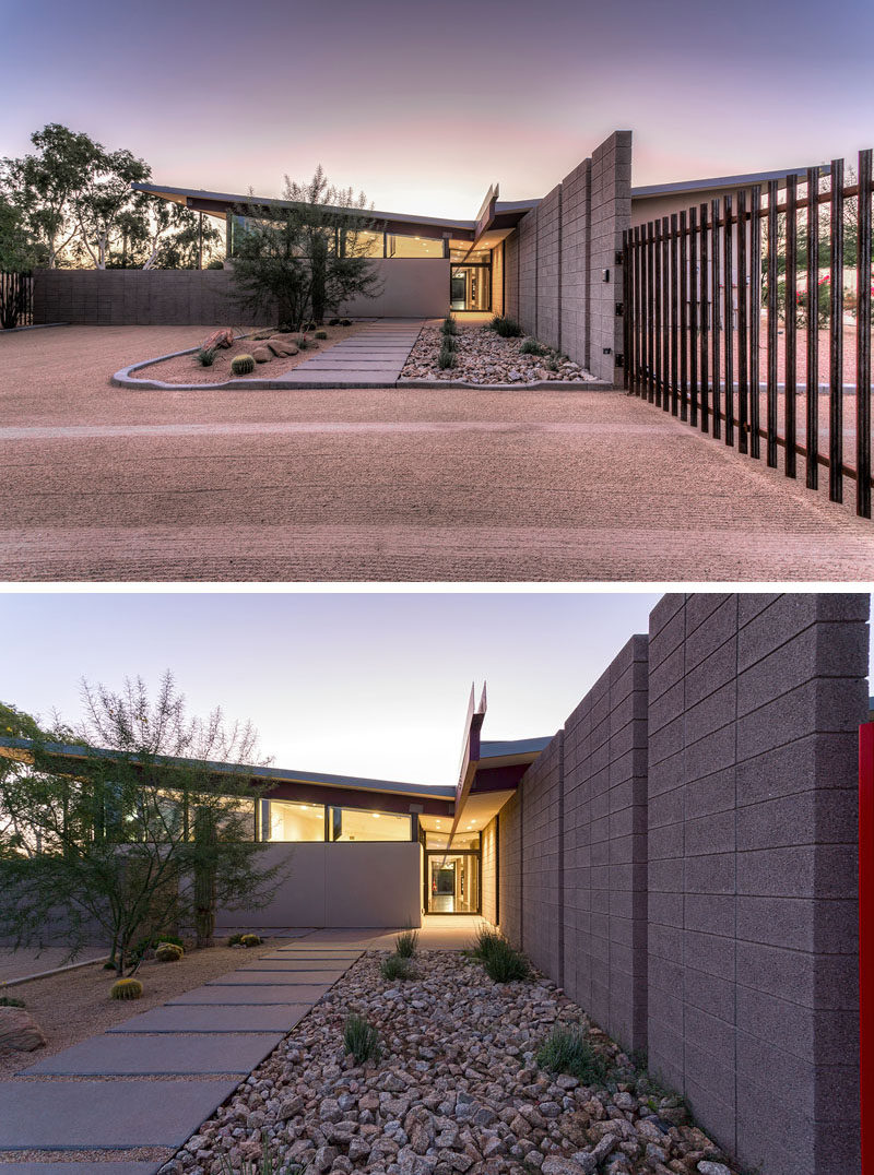 This modern house has a butterfly roof that appears to float over the home and defines its distinctive design. #ModernHouse #ButterflyRoof #Architecture