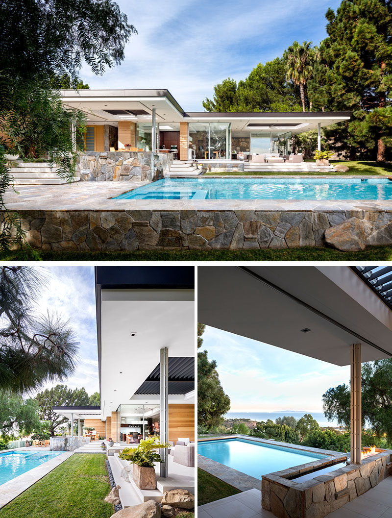 Both the living room and the kitchen of this modern house open to a patio that leads down to the swimming pool. #SwimmingPool #OutdoorSpace