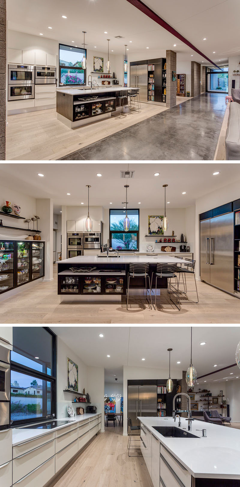 This kitchen has been designed around a central island, and has a combination of white and dark wood cabinets give the kitchen a modern but classic feel. #KitchenDesign #ModernKitchen