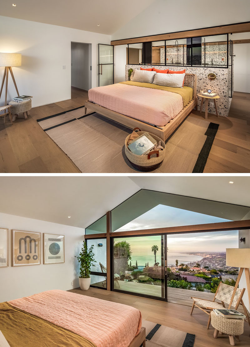 In this modern master bedroom suite, a glass partition showcases the bathroom, and allows views from the balcony to be enjoyed from the bathroom. #ModernBedroom #MasterBedroom