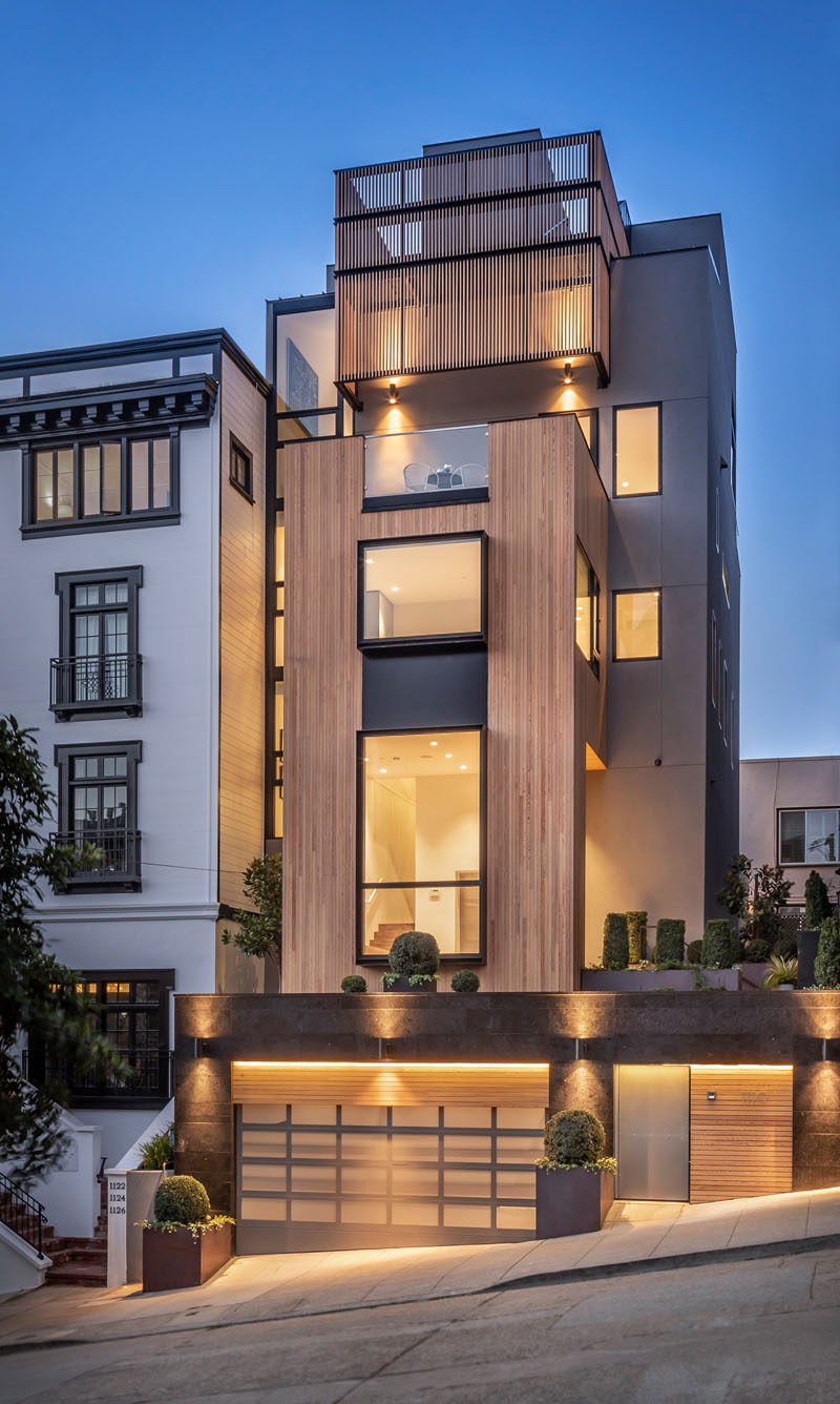 The Russian Hill Residence in San Francisco, spans four floors and features rare Siberian Larch that wraps around the facade. #ModernHouse #ModernInteriorDesign