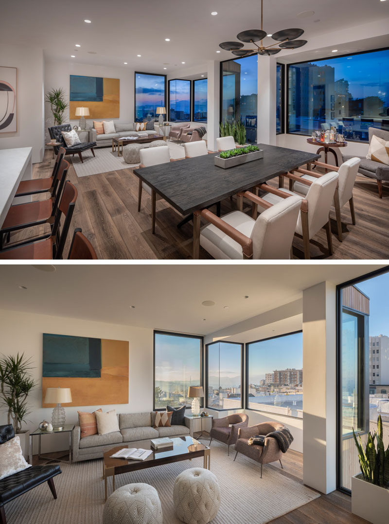 The dining table is anchored in the open space by a simple yet slightly sculptural pendant light, while in the living room, windows that line the corner provide plenty of natural light. #DiningRoom #LivingRoom #OpenPlanInterior