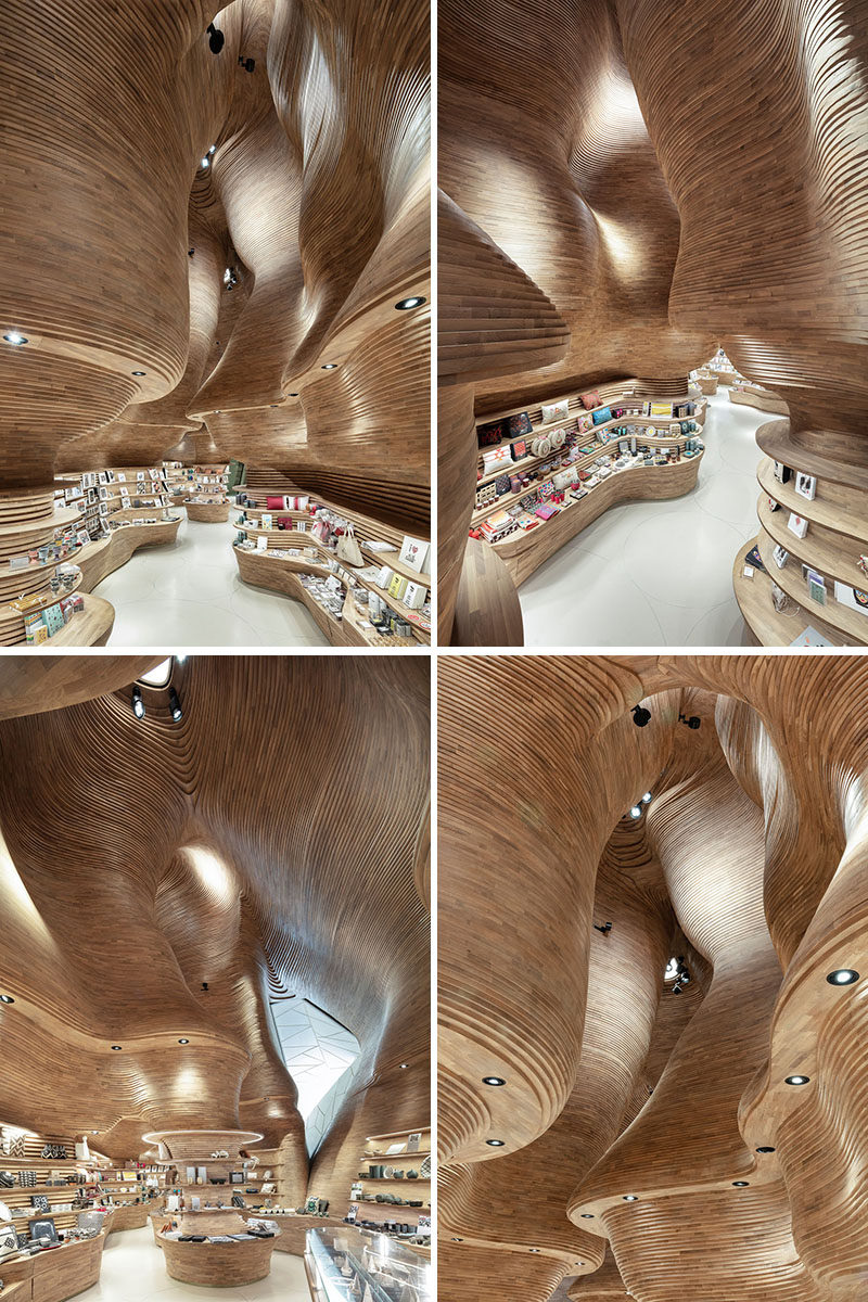 Inspired by a cave, the design of the gift shop at the National Museum of Qatar features 40,000 wood pieces that create a cave-like interior. #RetailDesign #RetailStore #ModernStore #Wood