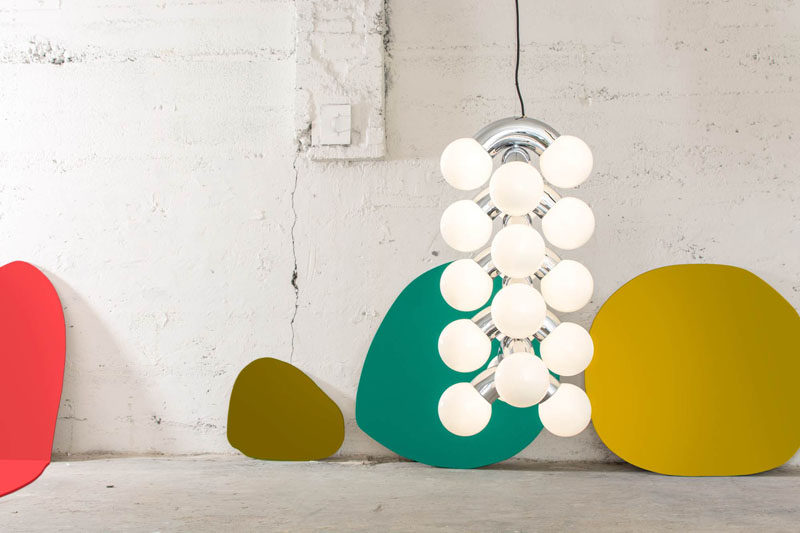 Designer Caine Heintzman has created VINE, a sculptural and vertical pendant light, that provides a big presence with a small energy draw by using low wattage LED lamps. #Lighting #PendantLight #ModernLighting #SculpturalLighting