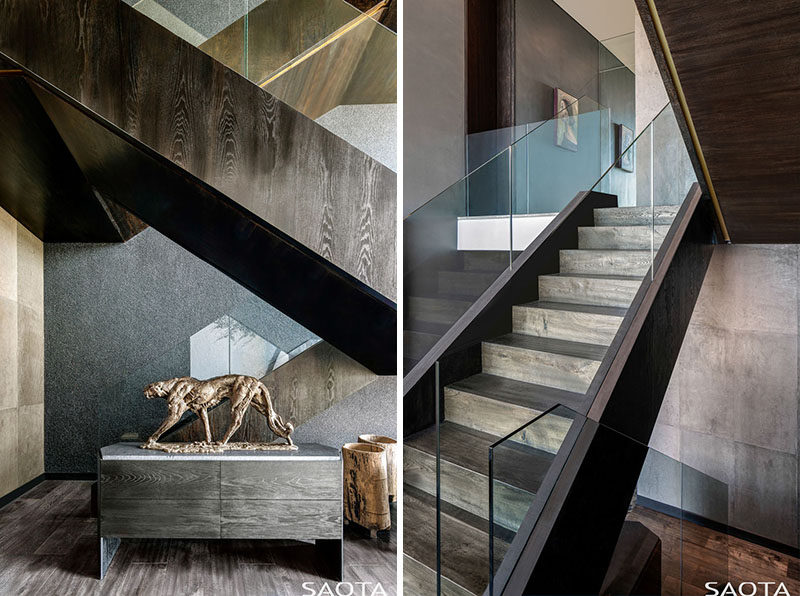 These modern wood stairs have glass handrails that appear to blend into the background. #ModernStairs