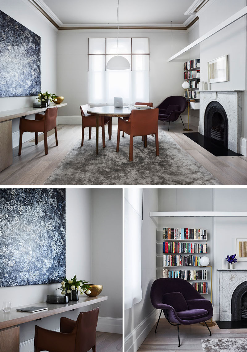 The finishes throughout this updated Victorian house are kept light and neutral in color to allow the owner’s art collection to shine. #HomeOffice #Fireplace #Shelving