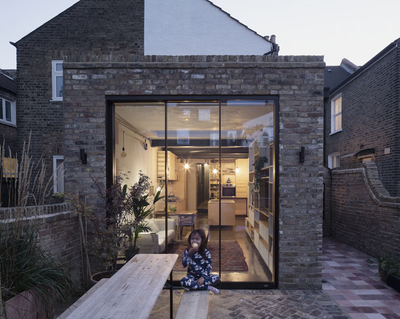 RISE Design Studio has designed the contemporary renovation and extension of a London flat, that's home to a family of five. #BrickExtension #Architecture