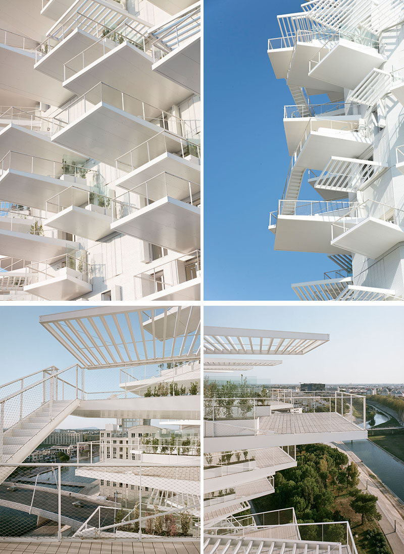 This modern apartment building in France has cantilevered balconies that surround it, while stairs connect the various outdoor spaces. #ModernArchitecture #BuildingDesign #Balconies