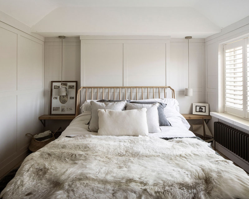 This updated bedroom retains the charm and character of the original house. #BedroomDesign