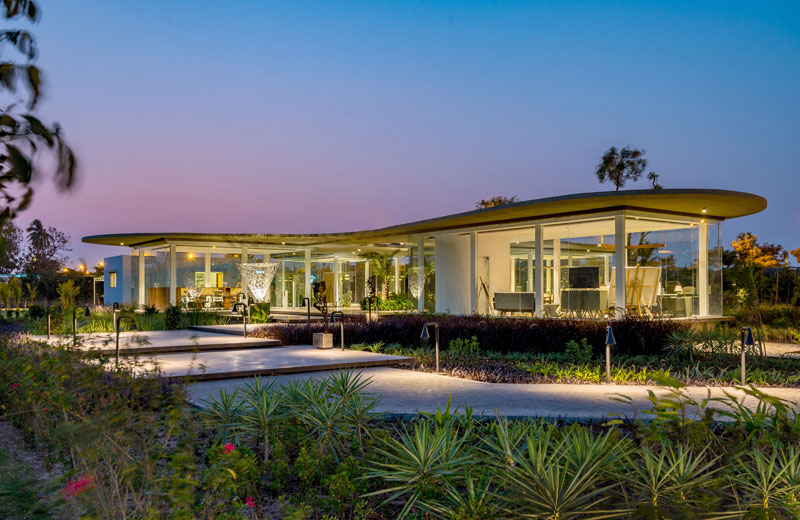 Hiren Patel Architects have recently completed Amoeba, a modern office for their firm, that includes two directors offices, a meeting room, and an administration area. #ModernOffice #ModernArchitecture #GlassWalls #CantileveredRoof