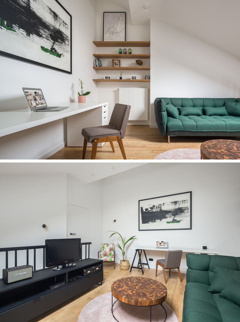 In this modern apartment, a mezzanine is home to a simple black entertainment stand that complements the black balustrade, while open wood shelving makes use of a small alcove. #LivingRoom #Mezzanine #Apartment