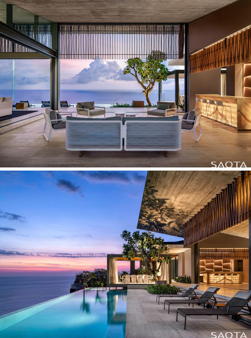 This modern house is located on a limestone cliff edge, and as such, the social areas of the house as well as the swimming pool, all have picturesque ocean views. #ModernInteriorDesign #SwimmingPool #LivingRoom