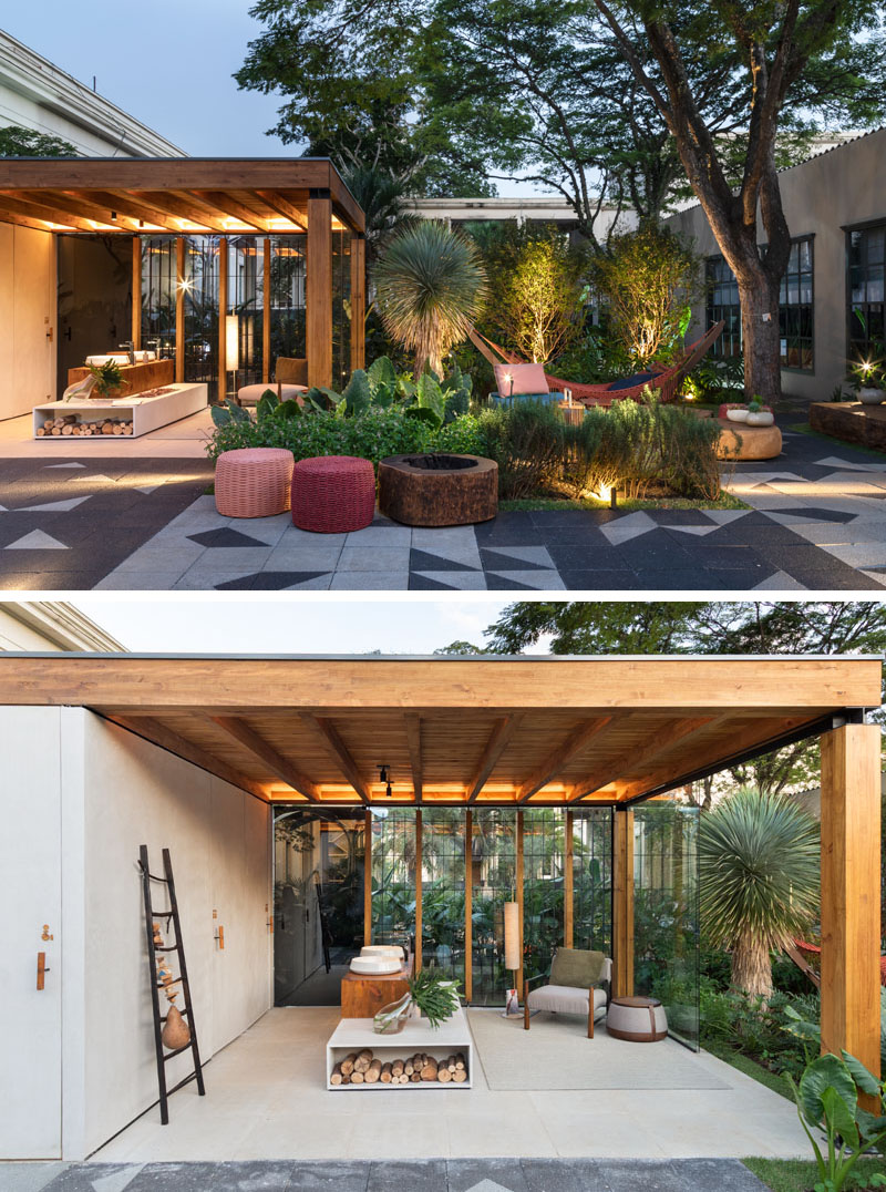 This modern outdoor terrace includes a wooden structure made from Brazilian pinus, wall coverings and flooring made of concrete, a toilet area, waiting lounge, and a counter with basins and a fireplace. #OutdoorTerrace #Terrace #Architecture #OutdoorSpace