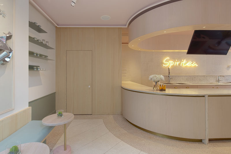 The service area of this modern tea store, has been designed as a stage for baristas to showcase the drink-crafting process. #ServiceArea #InteriorDesign #HospitalityDesign #TeaStore