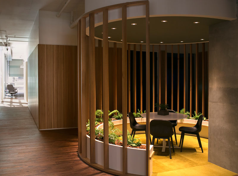 Workplace Ideas - The design of this modern communal seating with planters, was inspired by Fairy Rings found in the forest. #WorkplaceDesign #OfficeDesign #SeatingDesign #CommunalSeating #InteriorDesign